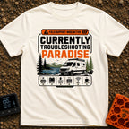 Paradise Debugger Active - T-Shirt in Ivory - A white camper van is parked beside a lake with mountains and pine trees in...