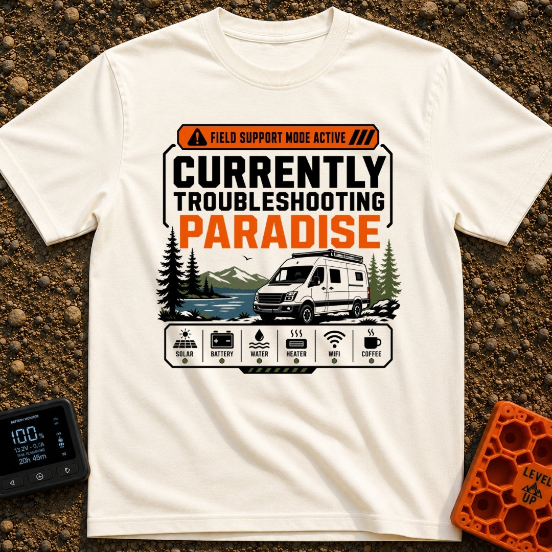 Paradise Debugger Active - T-Shirt in Ivory - A white camper van is parked beside a lake with mountains and pine trees in...