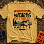 Paradise Debugger Active - T-Shirt in Mustard - A white camper van is parked beside a lake with mountains and pine trees...