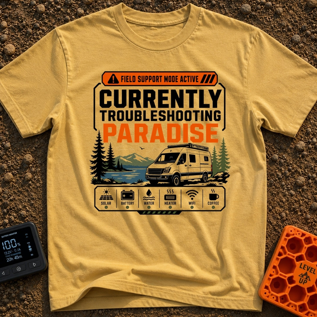 Paradise Debugger Active - T-Shirt in Mustard - A white camper van is parked beside a lake with mountains and pine trees...