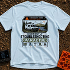 Troubleshooting In Paradise - T-Shirt in Chambray - A white camper van is parked next to a lake with mountains in the...
