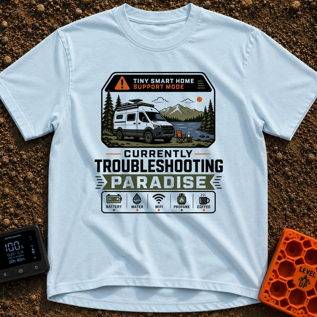 Troubleshooting In Paradise - T-Shirt in Chambray - A white camper van is parked next to a lake with mountains in the...