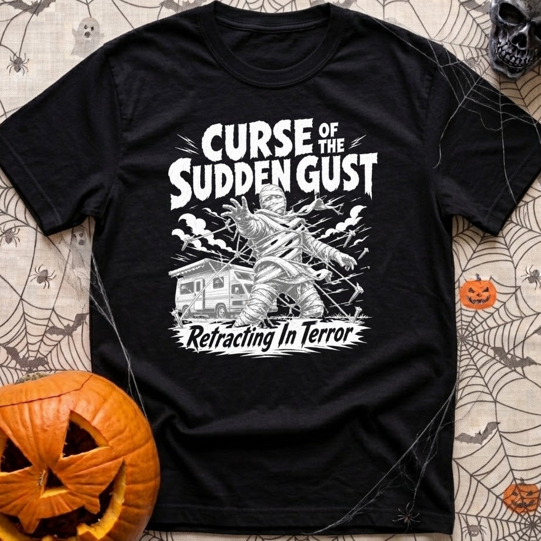 The Awning Curse - T-Shirt in Black - A black-and-white illustration of a mummy tangled in ropes and torn fabric standing...