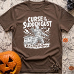 The Awning Curse - T-Shirt in Espresso - A black-and-white illustration of a mummy tangled in ropes and torn fabric...