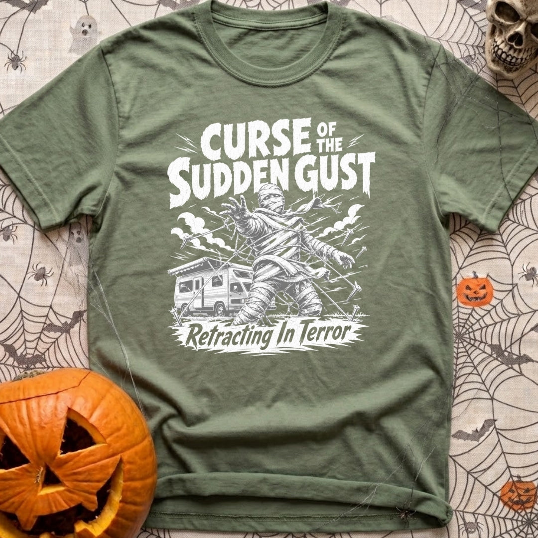 The Awning Curse - T-Shirt in Moss - A black-and-white illustration of a mummy tangled in ropes and torn fabric standing...