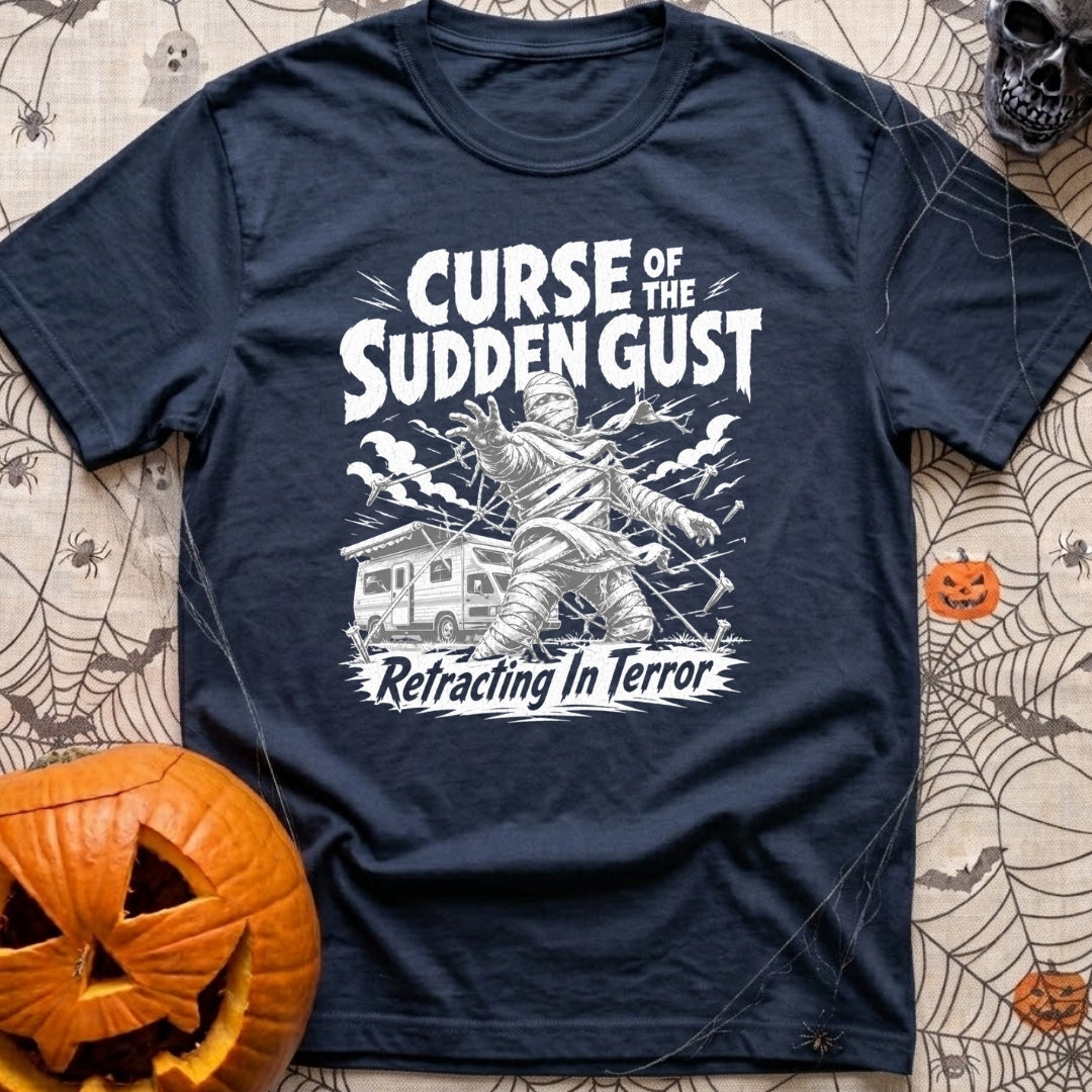The Awning Curse - T-Shirt in Navy - A black-and-white illustration of a mummy tangled in ropes and torn fabric standing...