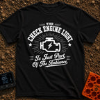 That Check Engine Glow - T-Shirt in Black - A graphic design featuring the text "THE CHECK ENGINE LIGHT" in distressed...