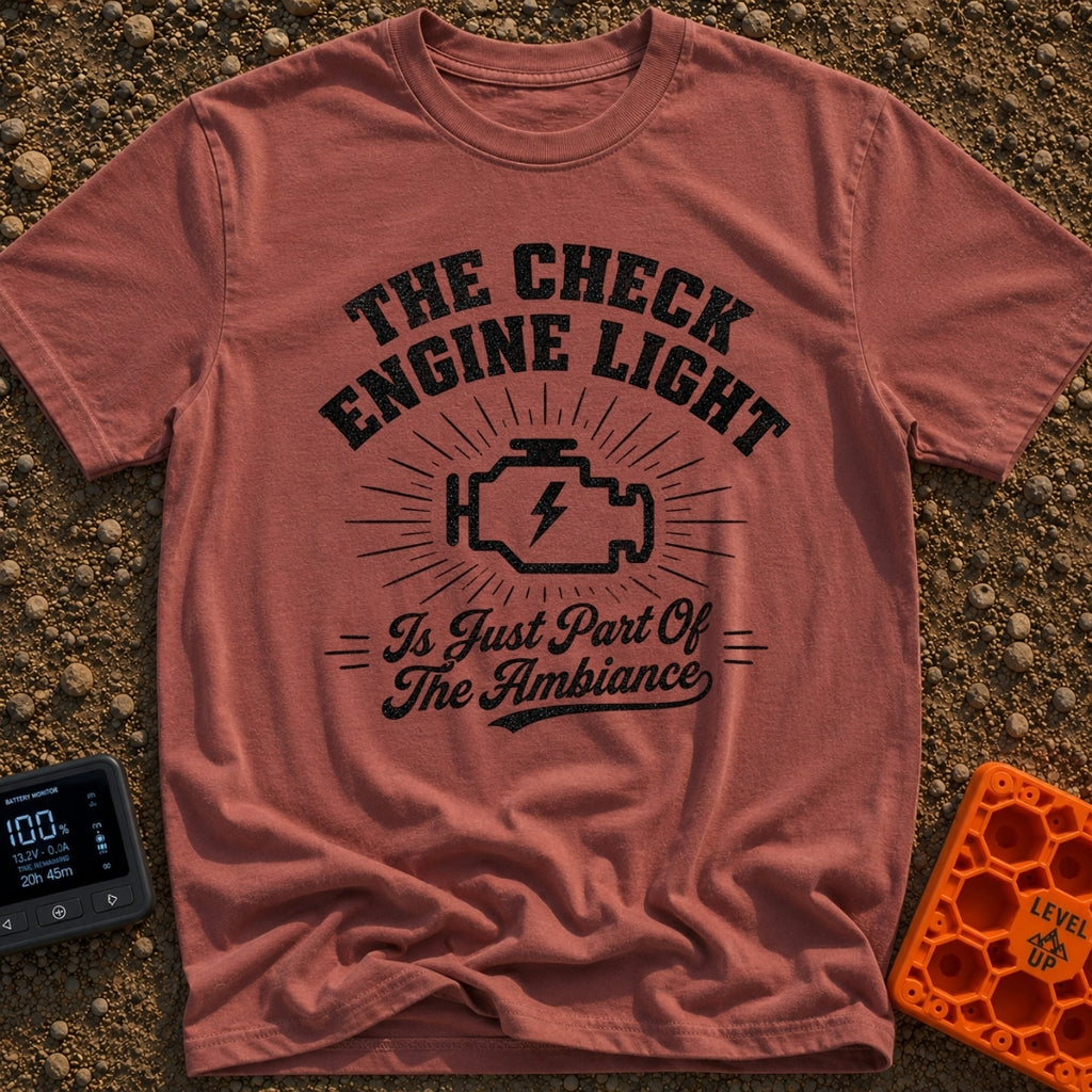 That Check Engine Glow - T-Shirt in Brick - A graphic design featuring the text "THE CHECK ENGINE LIGHT" in distressed...