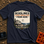 Deadlines Look Smaller - T-Shirt in Navy - A graphic illustration of a white camper van parked on a cliff edge...