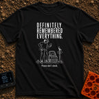 Pretty Sure I Packed - T-Shirt in Black - White line-art illustration of a person in hiking clothes looking down at a...