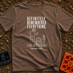 Pretty Sure I Packed - T-Shirt in Espresso - White line-art illustration of a person in hiking clothes looking down at a...