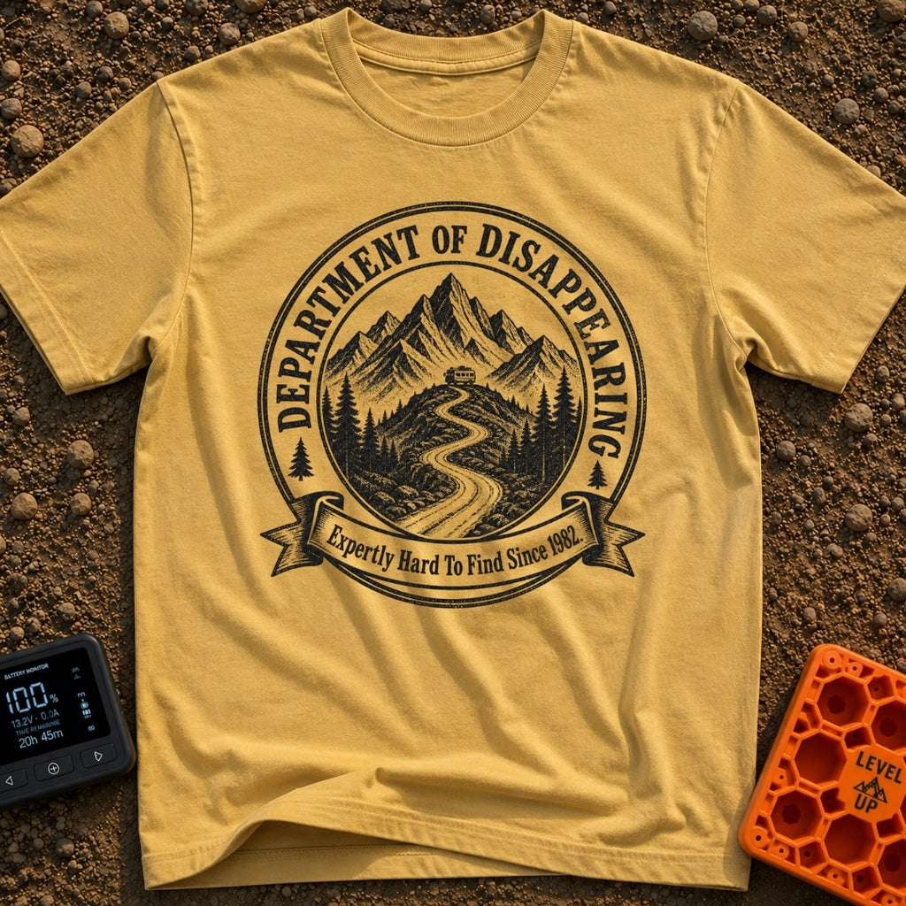 Chief Disappearing Officer - T-Shirt in Mustard - A black and white circular badge illustration showing a camper van...