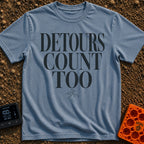 Every Detour Counts - T-Shirt in Blue Jean - Large, stacked serif text reading "DETOURS COUNT TOO" positioned above a...