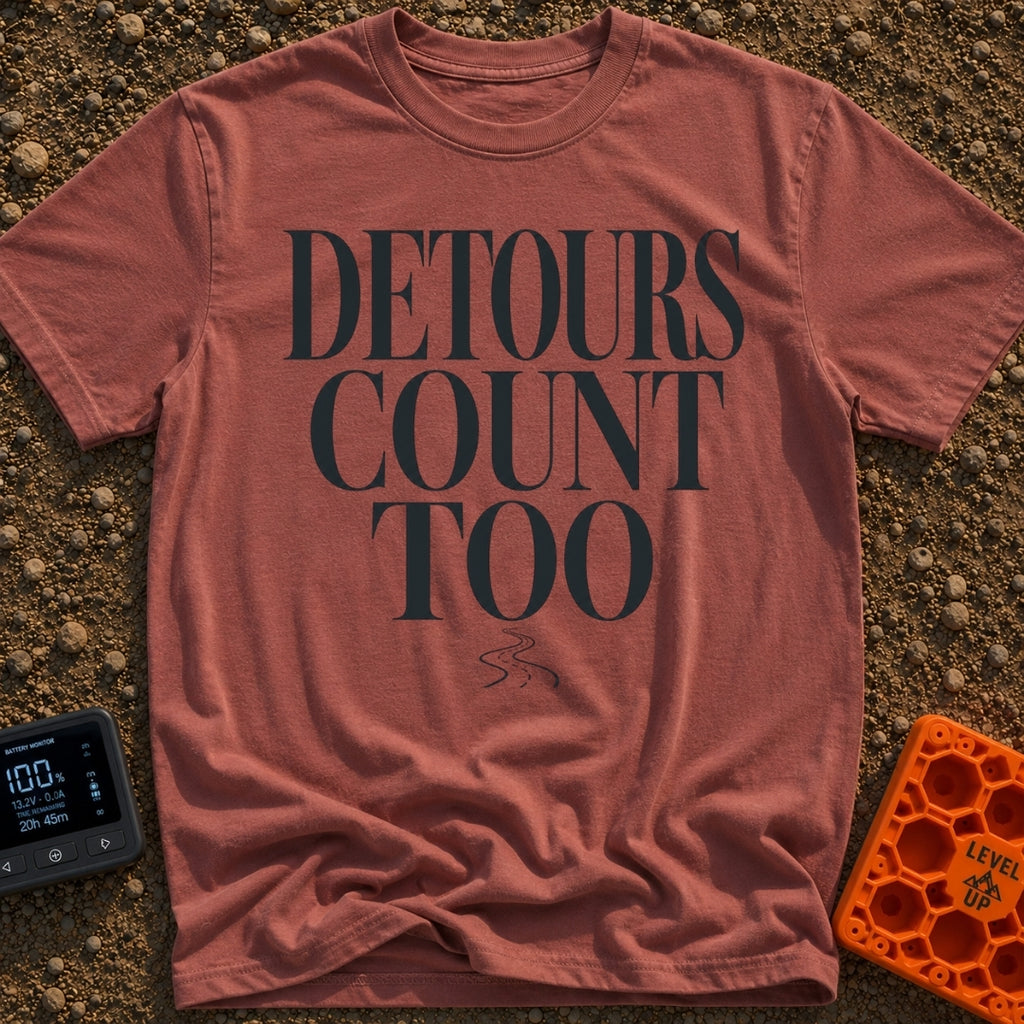 Every Detour Counts - T-Shirt in Brick - Large, stacked serif text reading "DETOURS COUNT TOO" positioned above a small,...