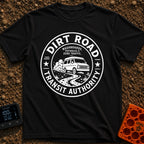 Dirt Road Commuter - T-Shirt in Black - A circular distressed-style badge featuring a van with a roof rack driving on a...