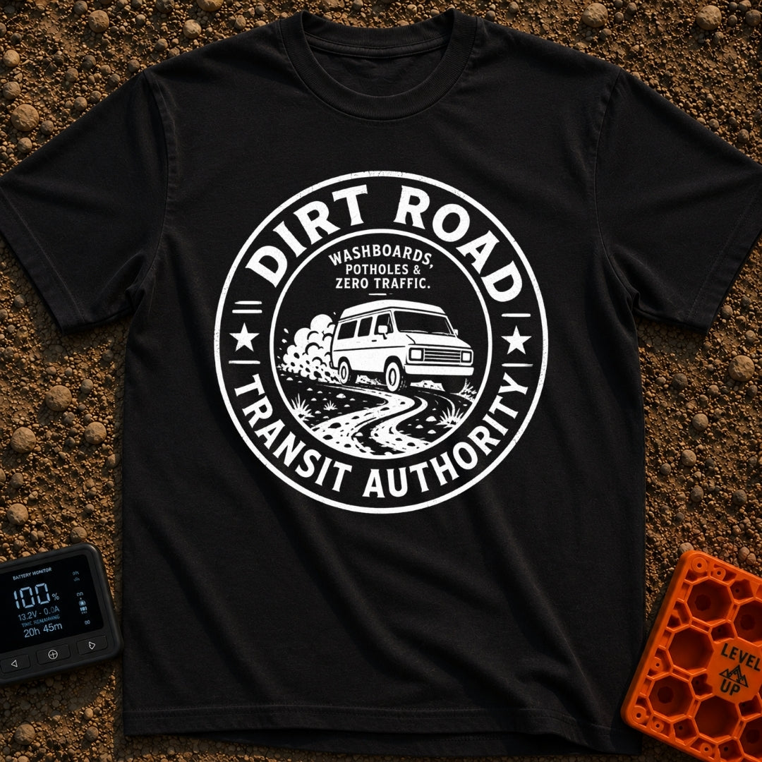 Dirt Road Commuter - T-Shirt in Black - A circular distressed-style badge featuring a van with a roof rack driving on a...
