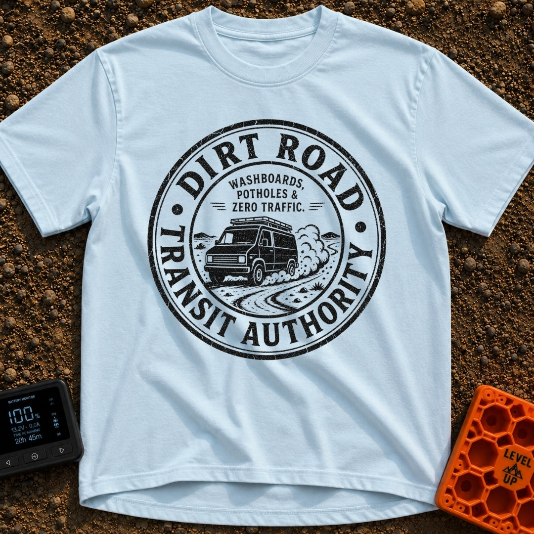 Dirt Road Commuter - T-Shirt in Chambray - A circular distressed-style badge featuring a van with a roof rack driving on...