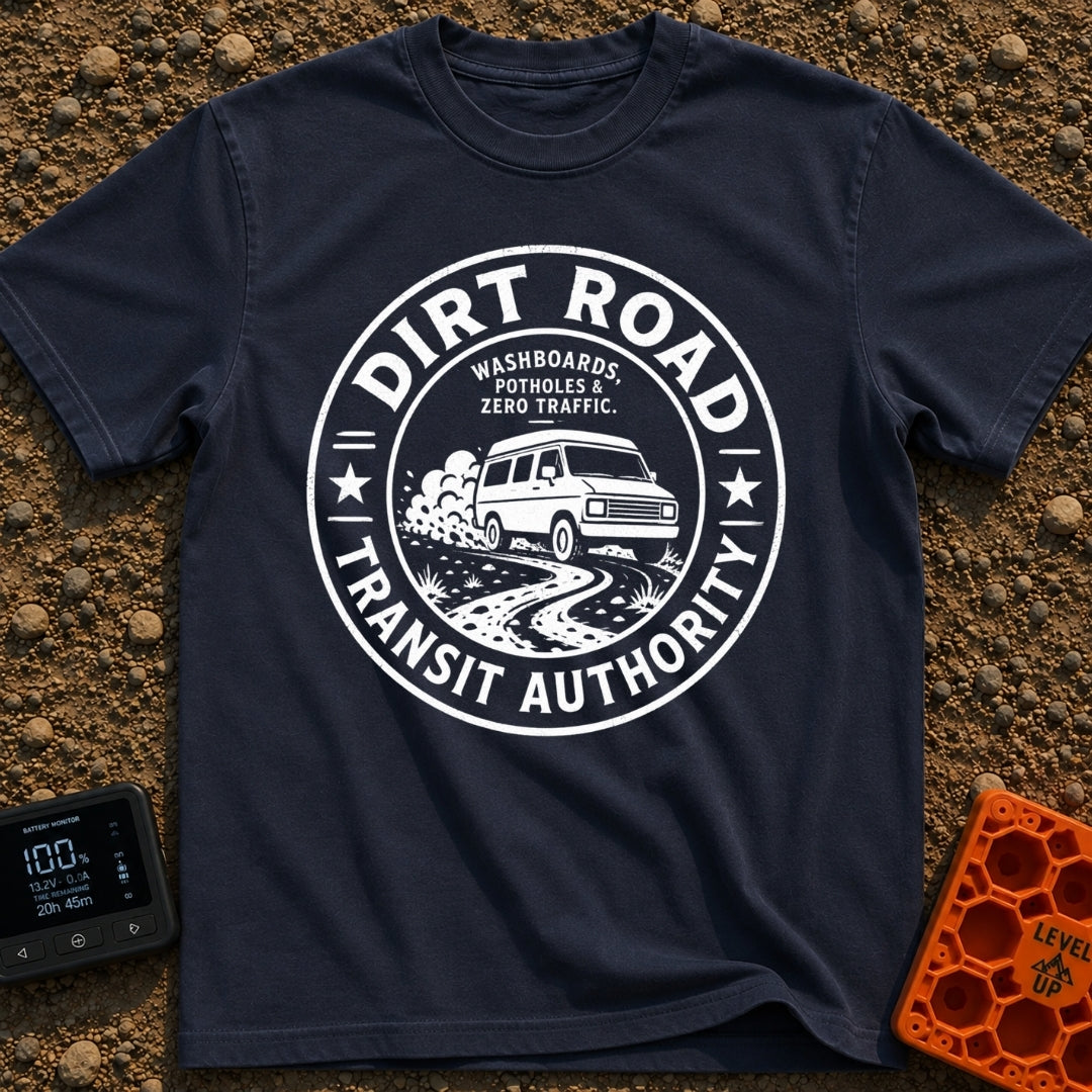 Dirt Road Commuter - T-Shirt in Navy - A circular distressed-style badge featuring a van with a roof rack driving on a...
