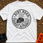 Dirt Road Commuter - T-Shirt in White - A circular distressed-style badge featuring a van with a roof rack driving on a...