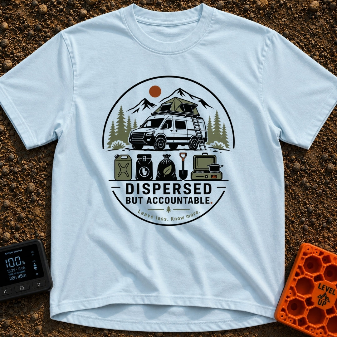 Dispersed But Accountable - T-Shirt in Chambray - A circular badge design featuring a high-clearance camper van with a...