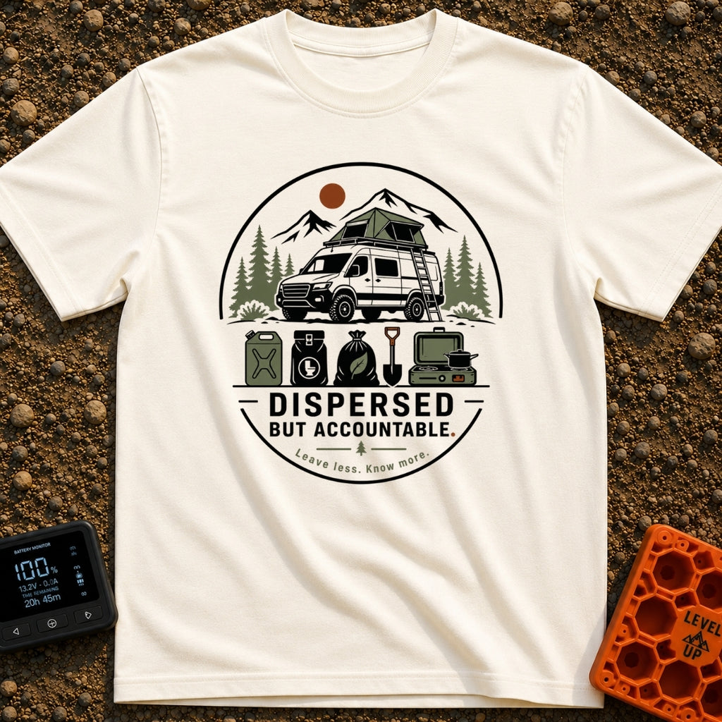 Dispersed But Accountable - T-Shirt in Ivory - A circular badge design featuring a high-clearance camper van with a...
