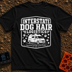 Fur Distribution Center - T-Shirt in Black - A black and white badge-style illustration of a camper van with a roof rack,...