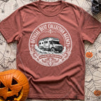 Dust Collector Inc - T-Shirt in Brick - A black-and-white circular badge illustration of a heavy-duty expedition camper...