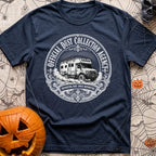 Dust Collector Inc - T-Shirt in Navy - A black-and-white circular badge illustration of a heavy-duty expedition camper...