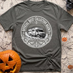 Dust Collector Inc - T-Shirt in Pepper - A black-and-white circular badge illustration of a heavy-duty expedition camper...
