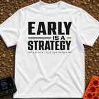 Early Bird Strategy - T-Shirt in White - A typographic design featuring the words "EARLY IS A STRATEGY" in large, bold...
