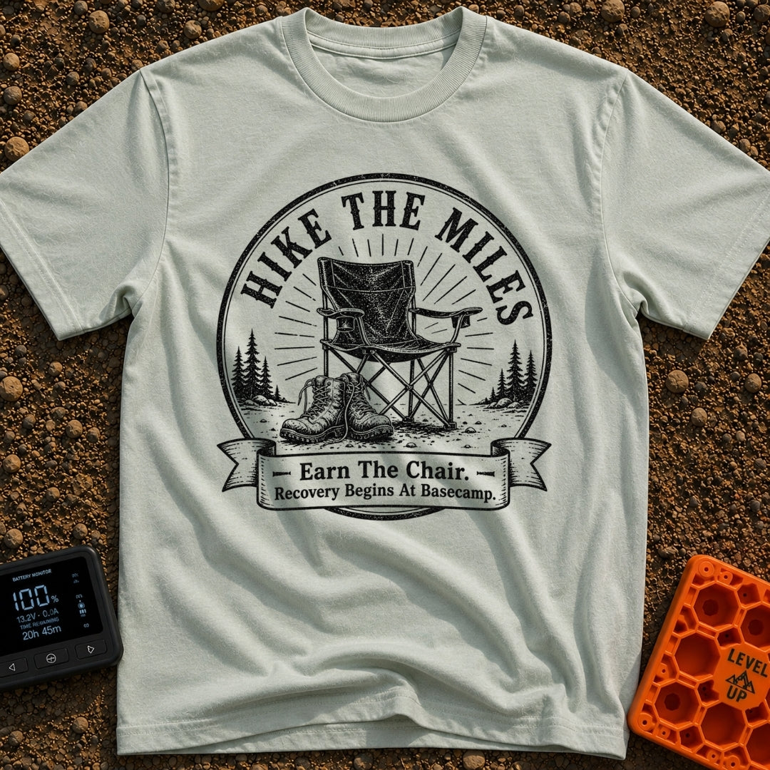 Earn Your Camp Chair - T-Shirt in Bay - A black and white circular graphic featuring a folding camp chair and a pair of...