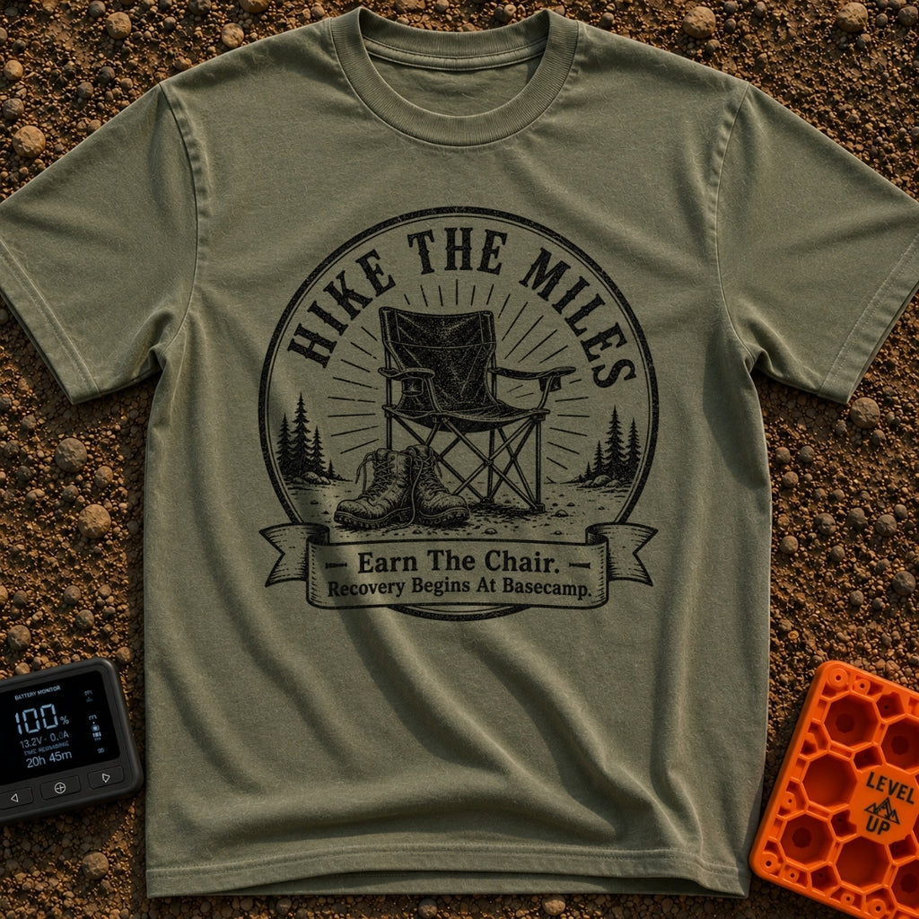 Earn Your Camp Chair - T-Shirt in Moss - A black and white circular graphic featuring a folding camp chair and a pair of...