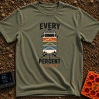 Every Watt Counts - T-Shirt in Moss - A front-facing van driving down a road, featuring solar panels on the roof and a...