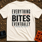 Eventually, It Bites - T-Shirt in Ivory - A text-only design reading "EVERYTHING BITES EVENTUALLY" in bold black,...