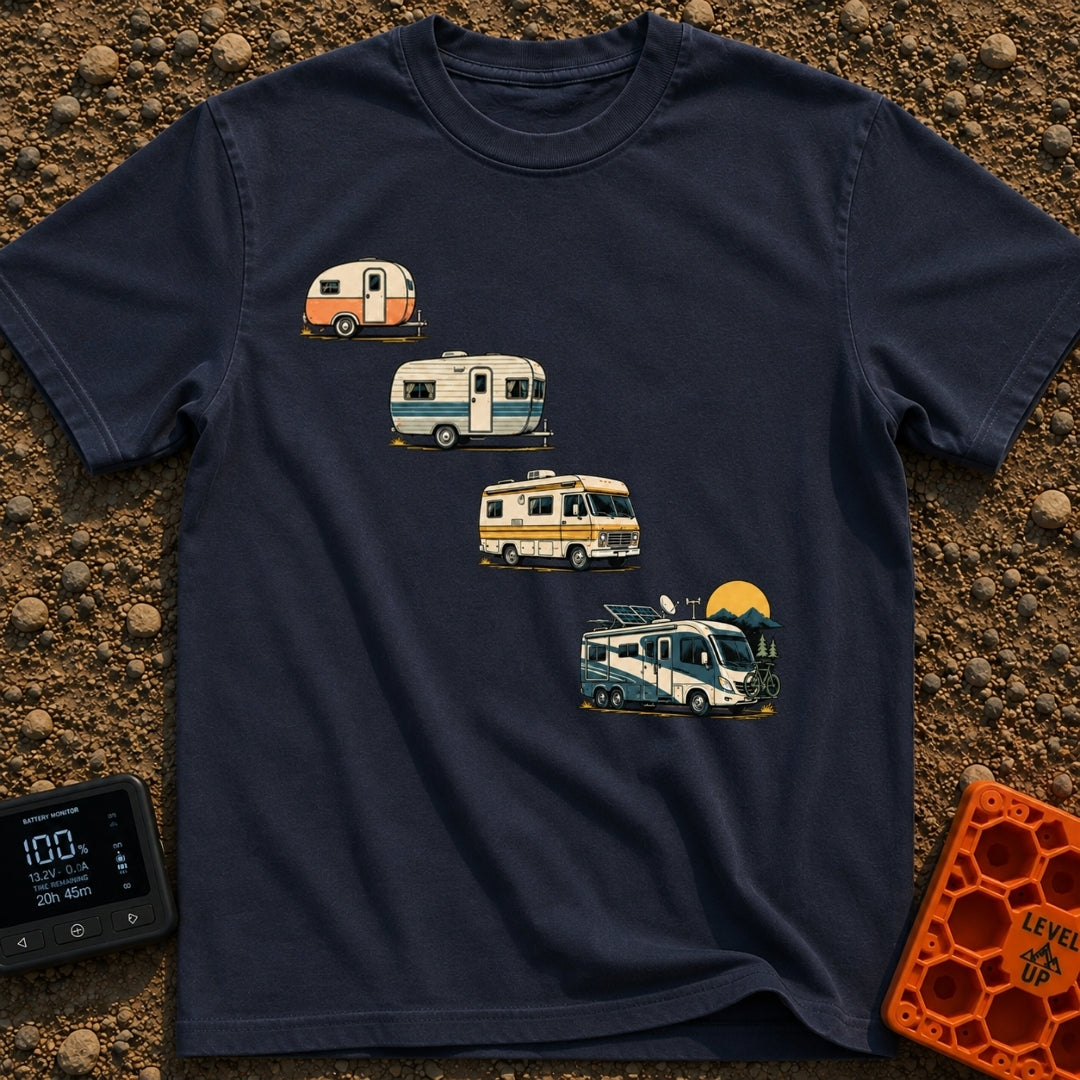 From Cave To Camper - T-Shirt in Navy - An illustration of four recreational vehicles arranged diagonally to show an...