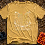 Debug the Falls - T-Shirt in Mustard - A black-and-white line drawing showing a waterfall flowing between rocky cliffs...