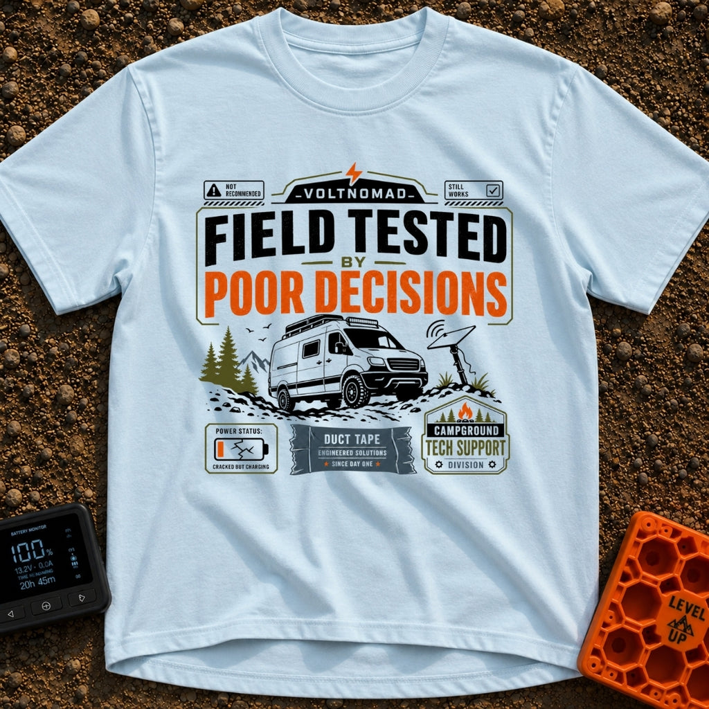 Tested By Poor Decisions - T-Shirt in Chambray - The design features a camper van parked on rocky terrain with mountains...