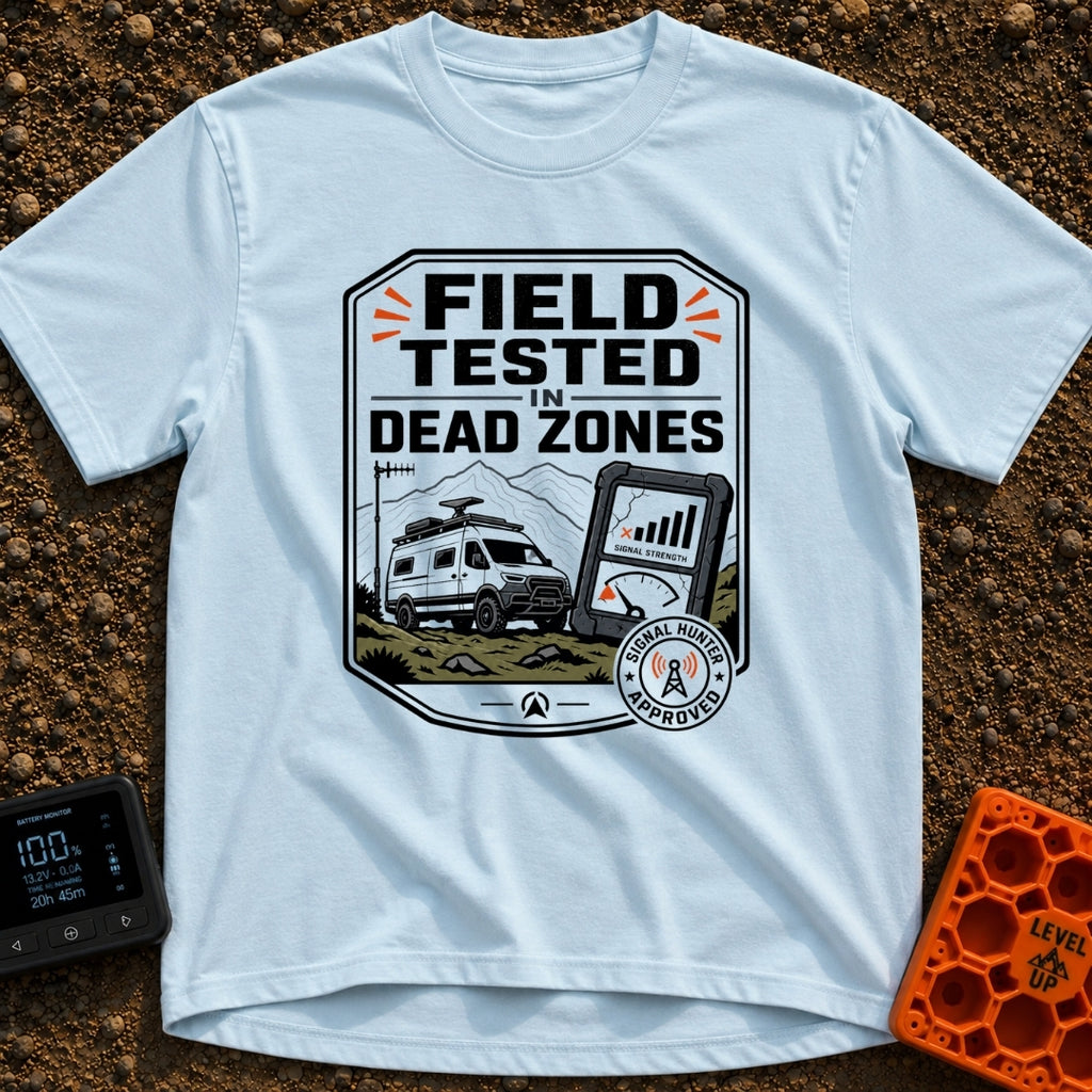 Tested In Dead Zones - T-Shirt in Chambray - A badge-style illustration showing a white camper van with roof antennas...