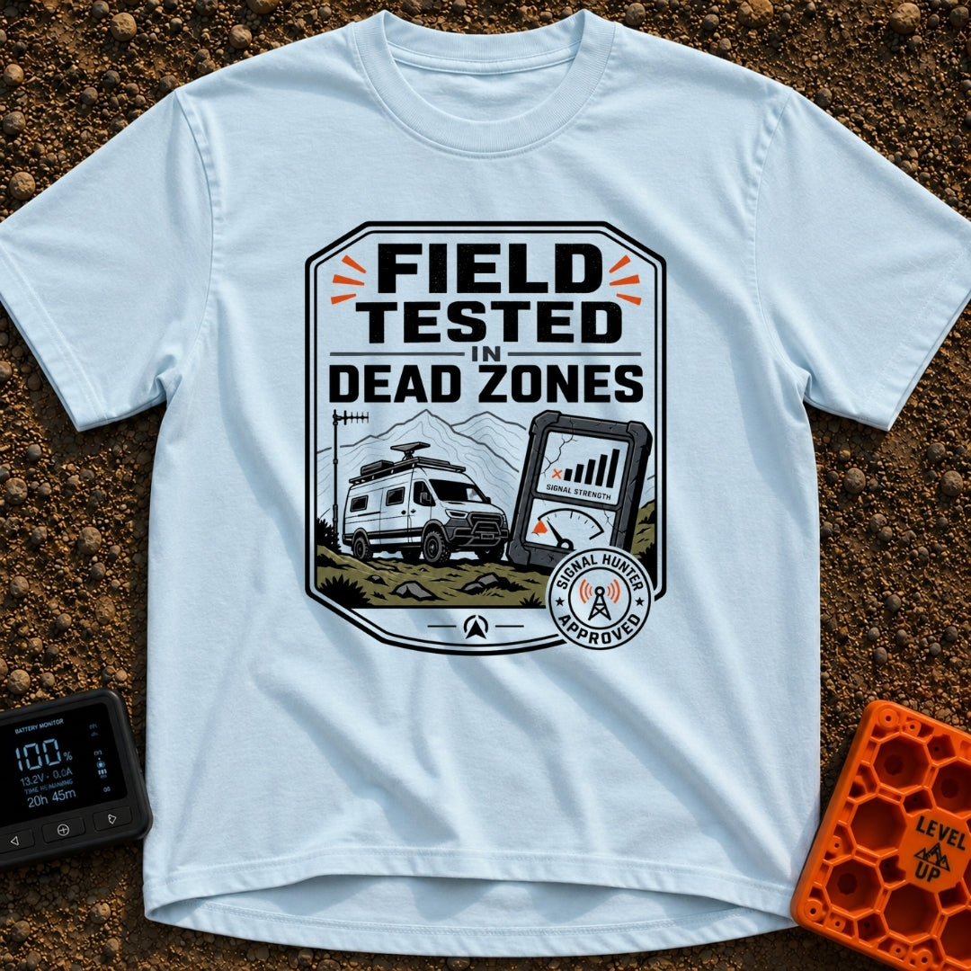 Tested In Dead Zones - T-Shirt in Chambray - A badge-style illustration showing a white camper van with roof antennas...