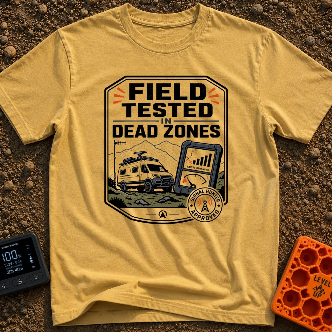 Tested In Dead Zones - T-Shirt in Mustard - A badge-style illustration showing a white camper van with roof antennas...