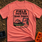 Tested In Dead Zones - T-Shirt in Watermelon - A badge-style illustration showing a white camper van with roof antennas...