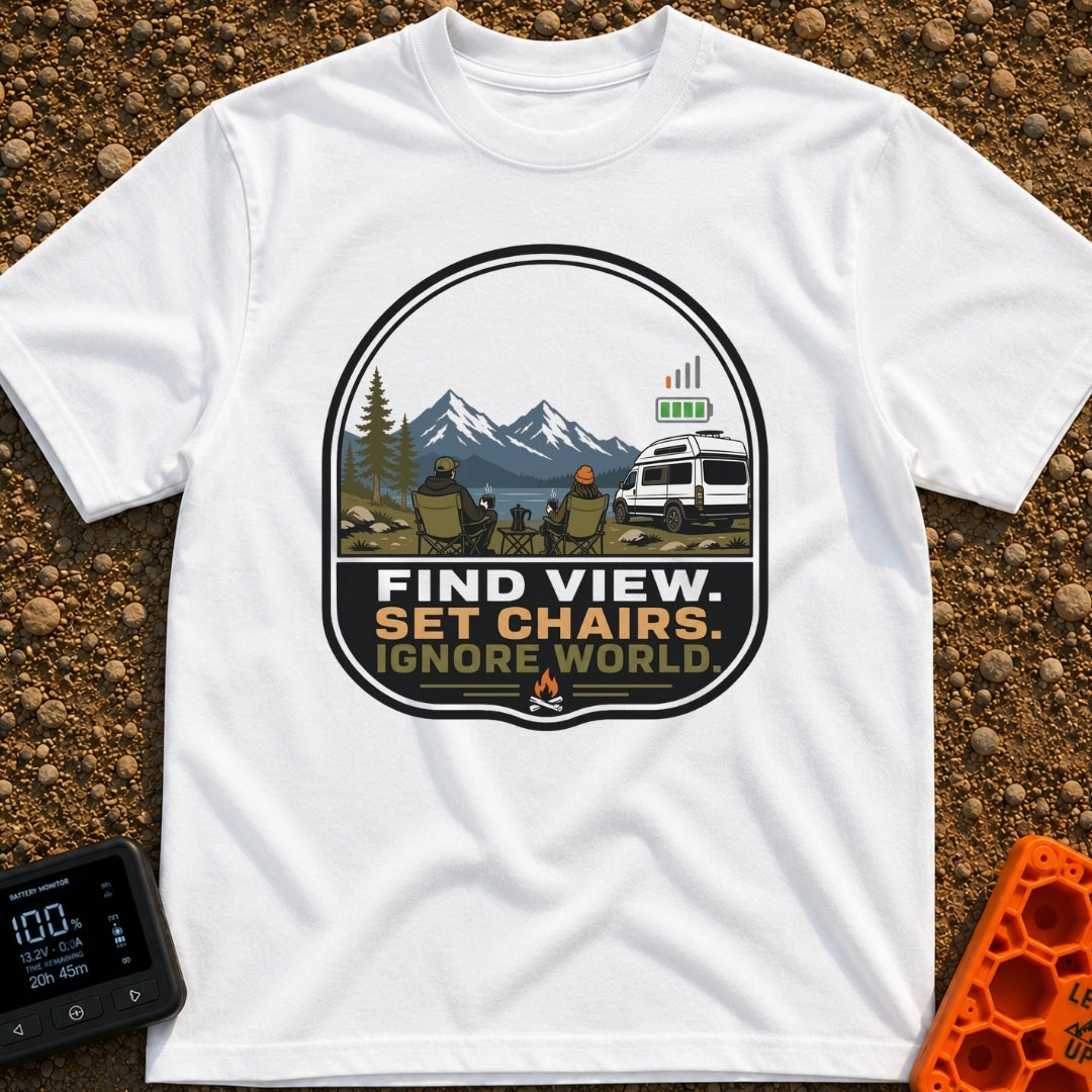 Set Chairs Ignore World - T-Shirt in White - An illustration of two people sitting in camp chairs holding mugs next to a...