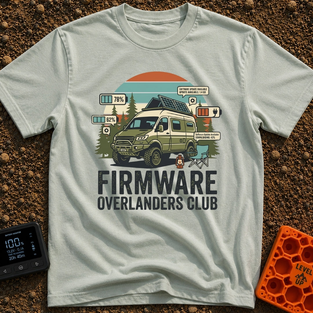 Overland Software Update - T-Shirt in Bay - A rugged, off-road camper van is parked in a forest setting with a camp...