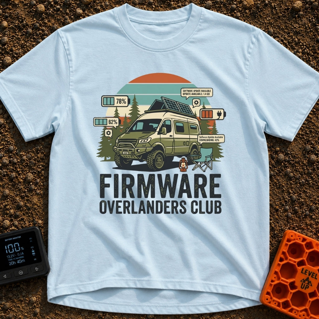 Overland Software Update - T-Shirt in Chambray - A rugged, off-road camper van is parked in a forest setting with a camp...