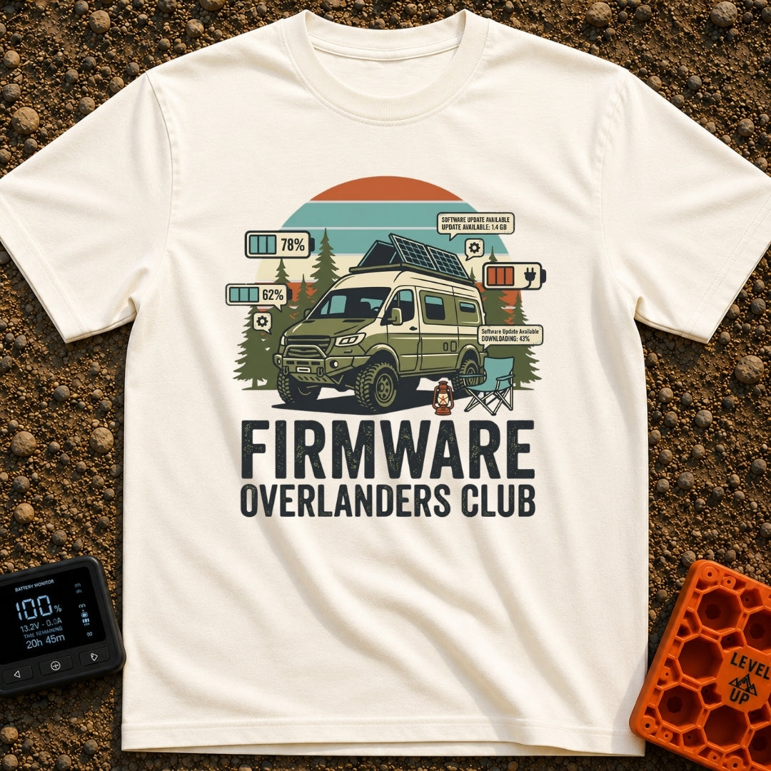 Overland Software Update - T-Shirt in Ivory - A rugged, off-road camper van is parked in a forest setting with a camp...