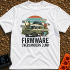 Overland Software Update - T-Shirt in White - A rugged, off-road camper van is parked in a forest setting with a camp...