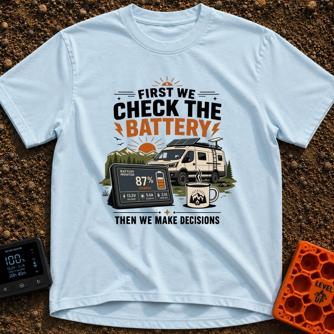 First Check The Battery - T-Shirt in Chambray - A white camper van with a roof-mounted solar panel parked near mountains...
