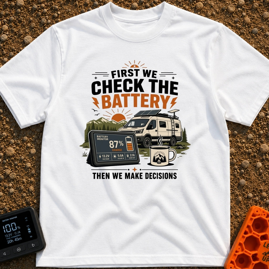 First Check The Battery - T-Shirt in White - A white camper van with a roof-mounted solar panel parked near mountains and...