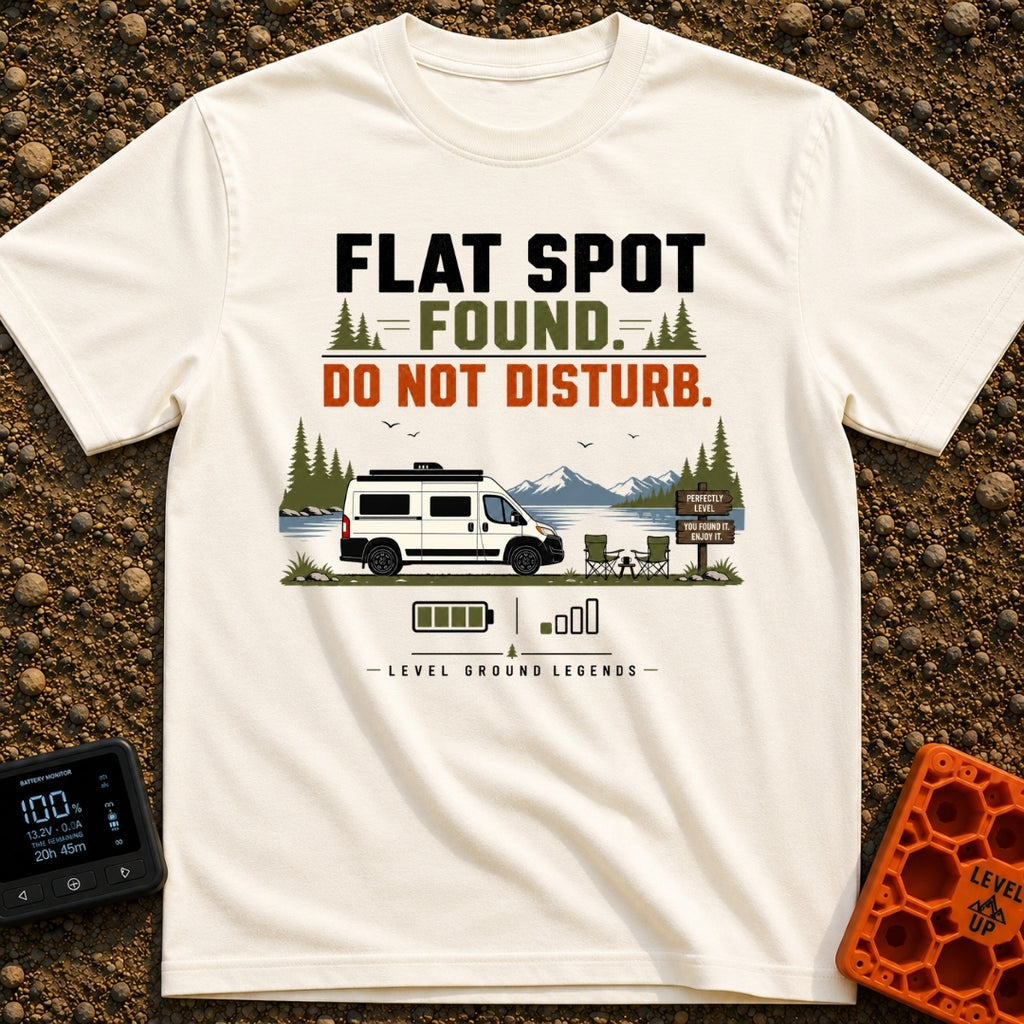 Flat Spot Found - T-Shirt in Ivory - A white camper van parked beside a lake with mountains in the background, next to...