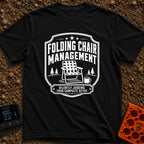 Chief Folding Officer - T-Shirt in Black - A black-and-white badge graphic featuring a vintage webbed folding camp chair...
